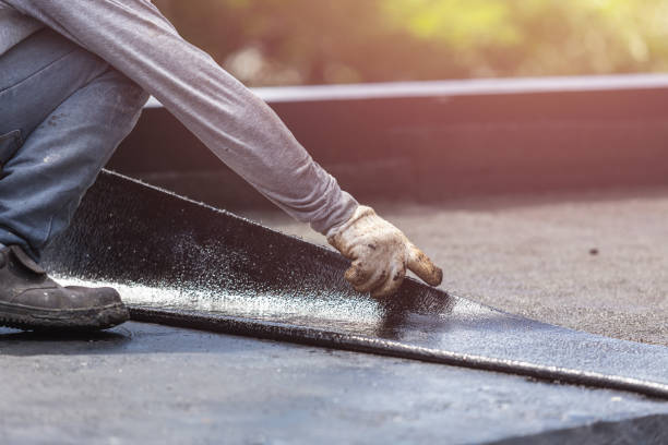 Professional Basement Waterproofing technician working in Columbus, MN
